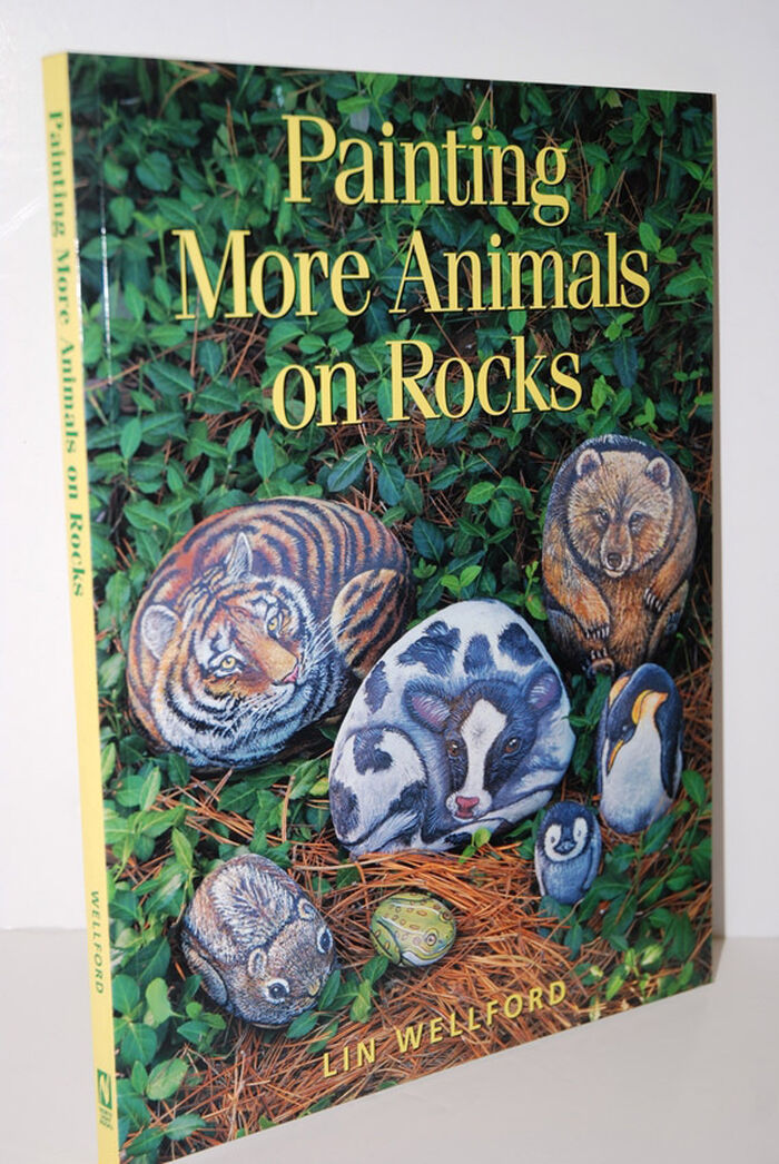 Painting More Animals on Rocks Image
